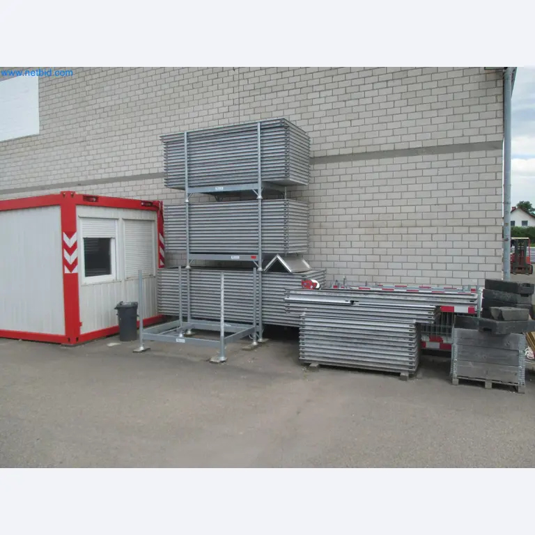 Scaffolding components (some from the construction site), machinery, and vehicles belonging to a construction company-2