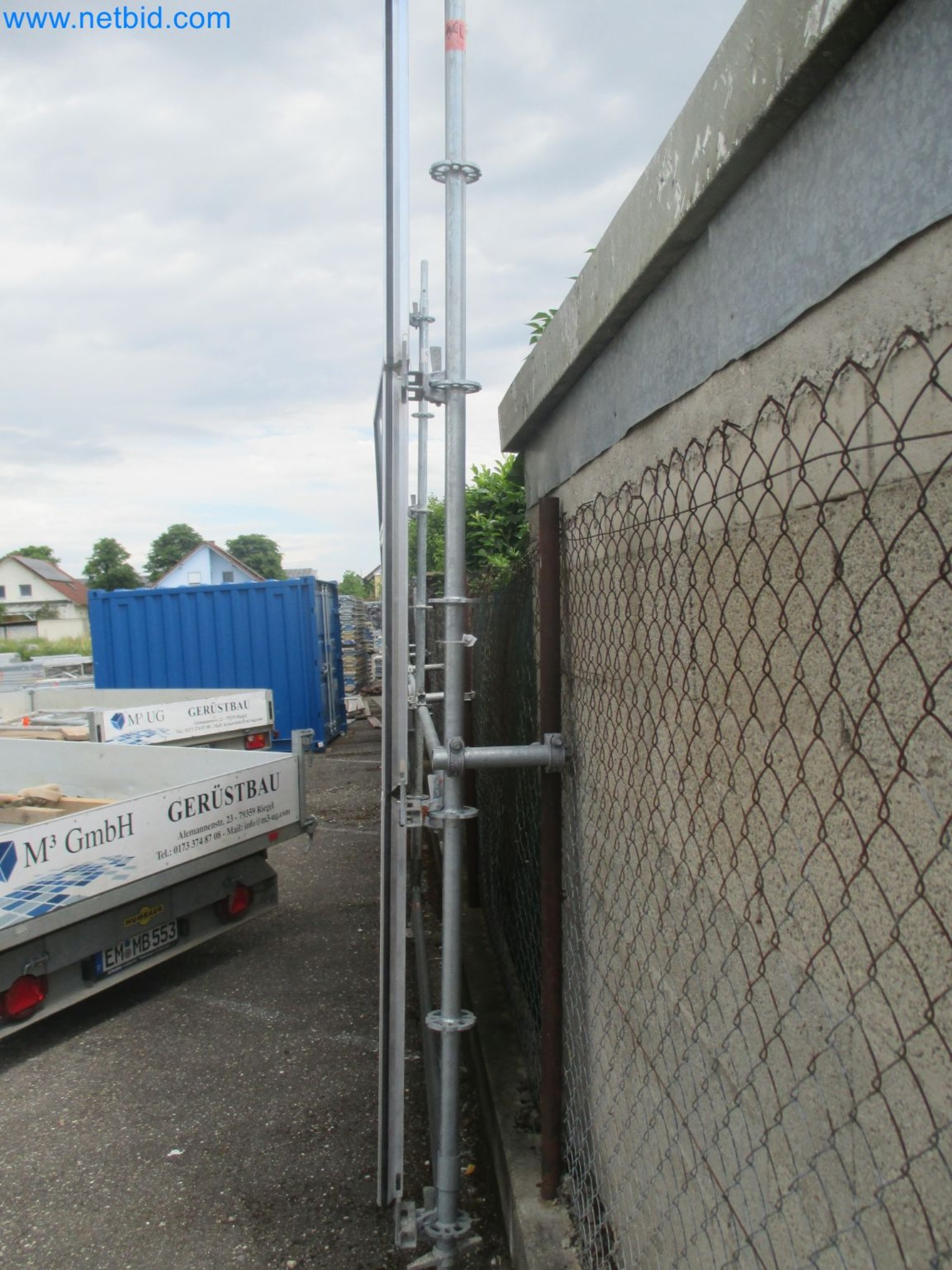 Scaffolding components (some from the construction site), machinery, and vehicles belonging to a construction company-4
