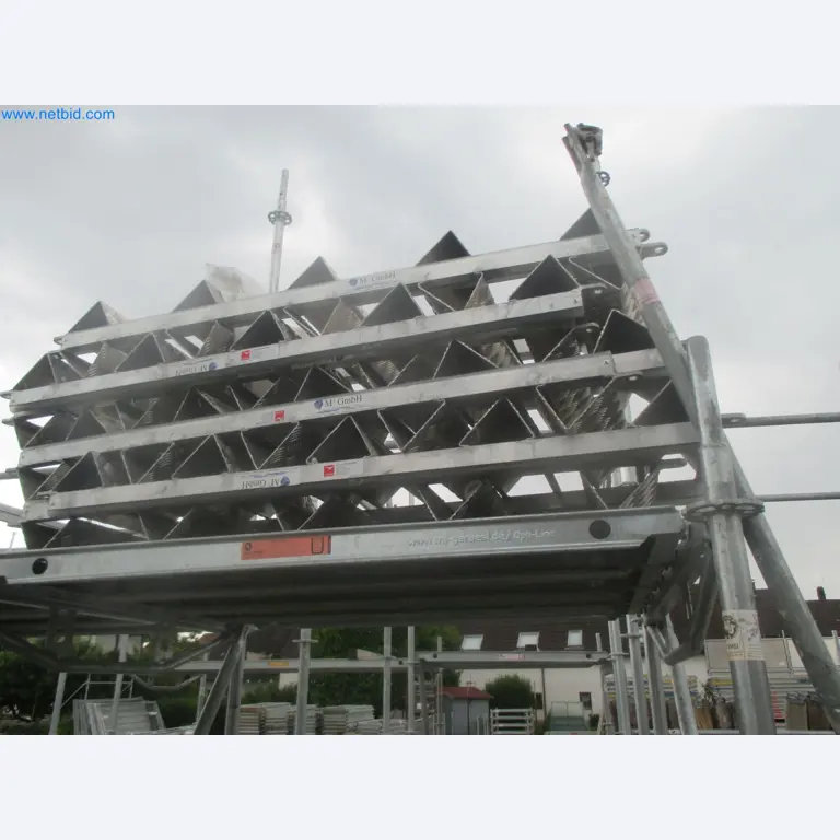 Scaffolding components (some from the construction site), machinery, and vehicles belonging to a construction company-1