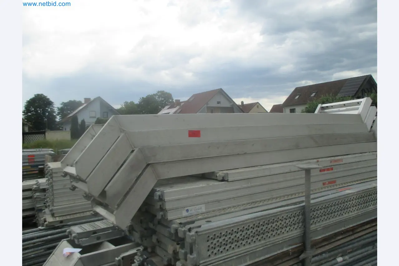 Scaffolding components (some from the construction site), machinery, and vehicles belonging to a construction company-2