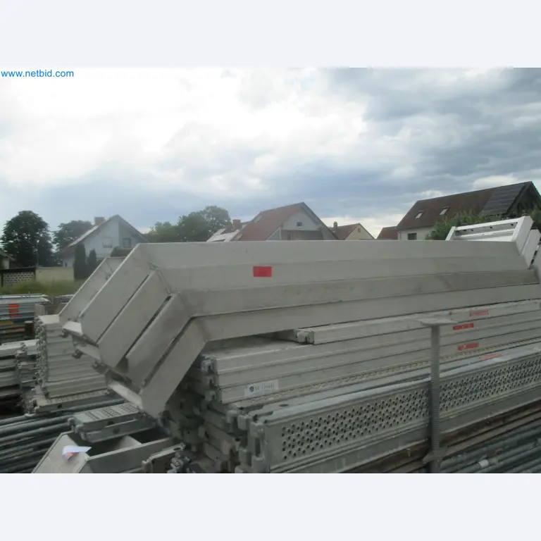 Scaffolding components (some from the construction site), machinery, and vehicles belonging to a construction company-2