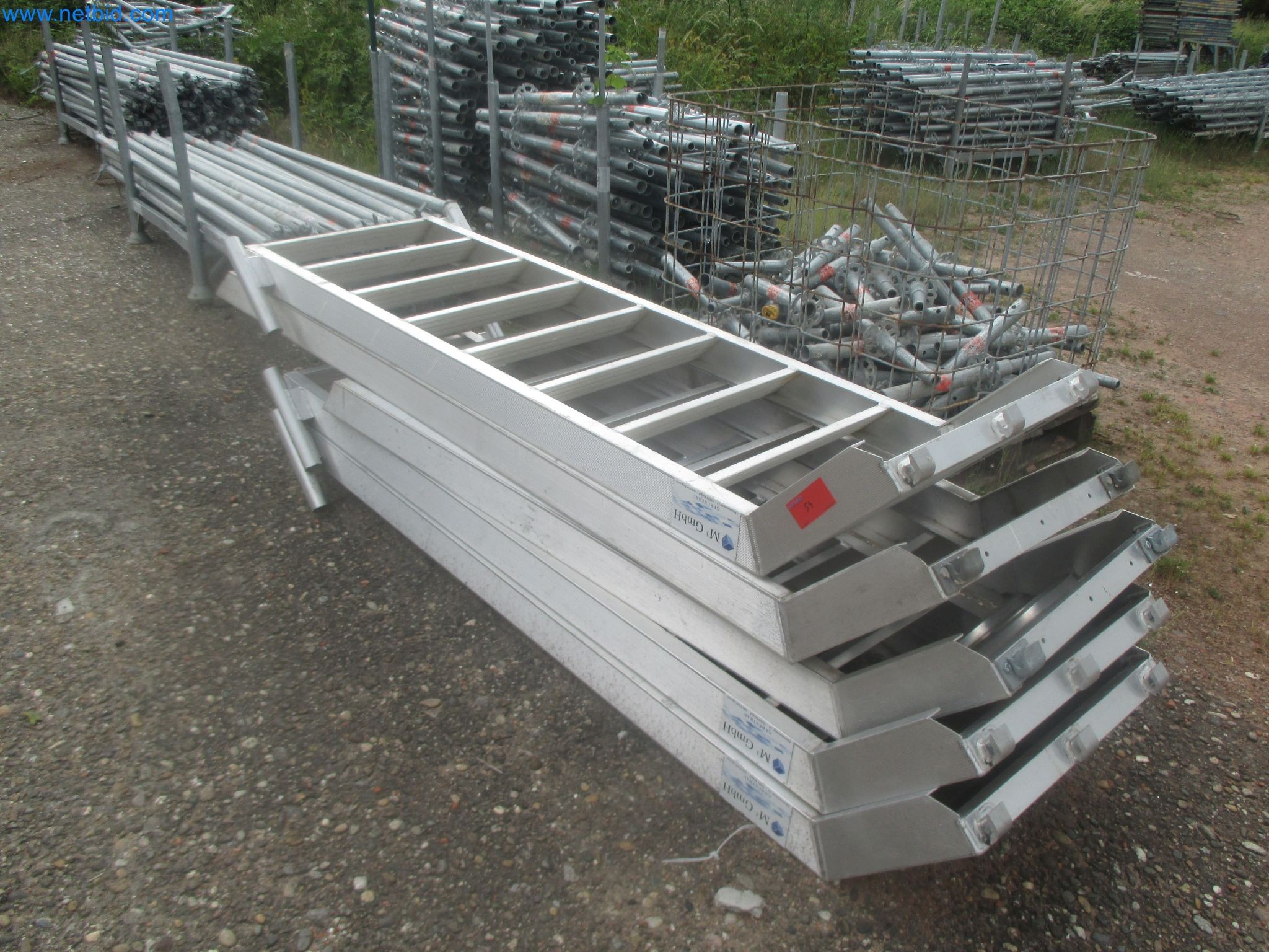 Scaffolding components (some from the construction site), machinery, and vehicles belonging to a construction company-3