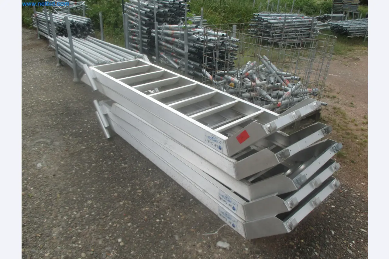 Scaffolding components (some from the construction site), machinery, and vehicles belonging to a construction company-3