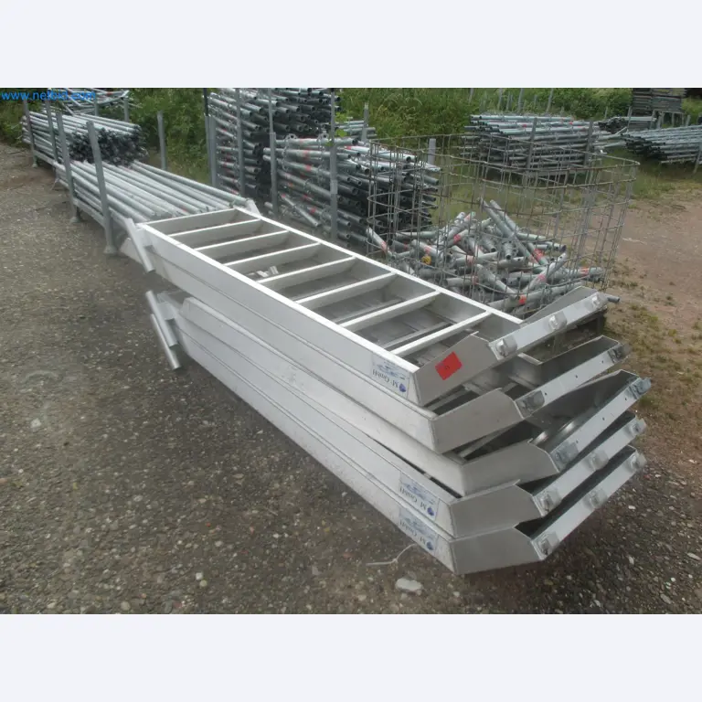 Scaffolding components (some from the construction site), machinery, and vehicles belonging to a construction company-3