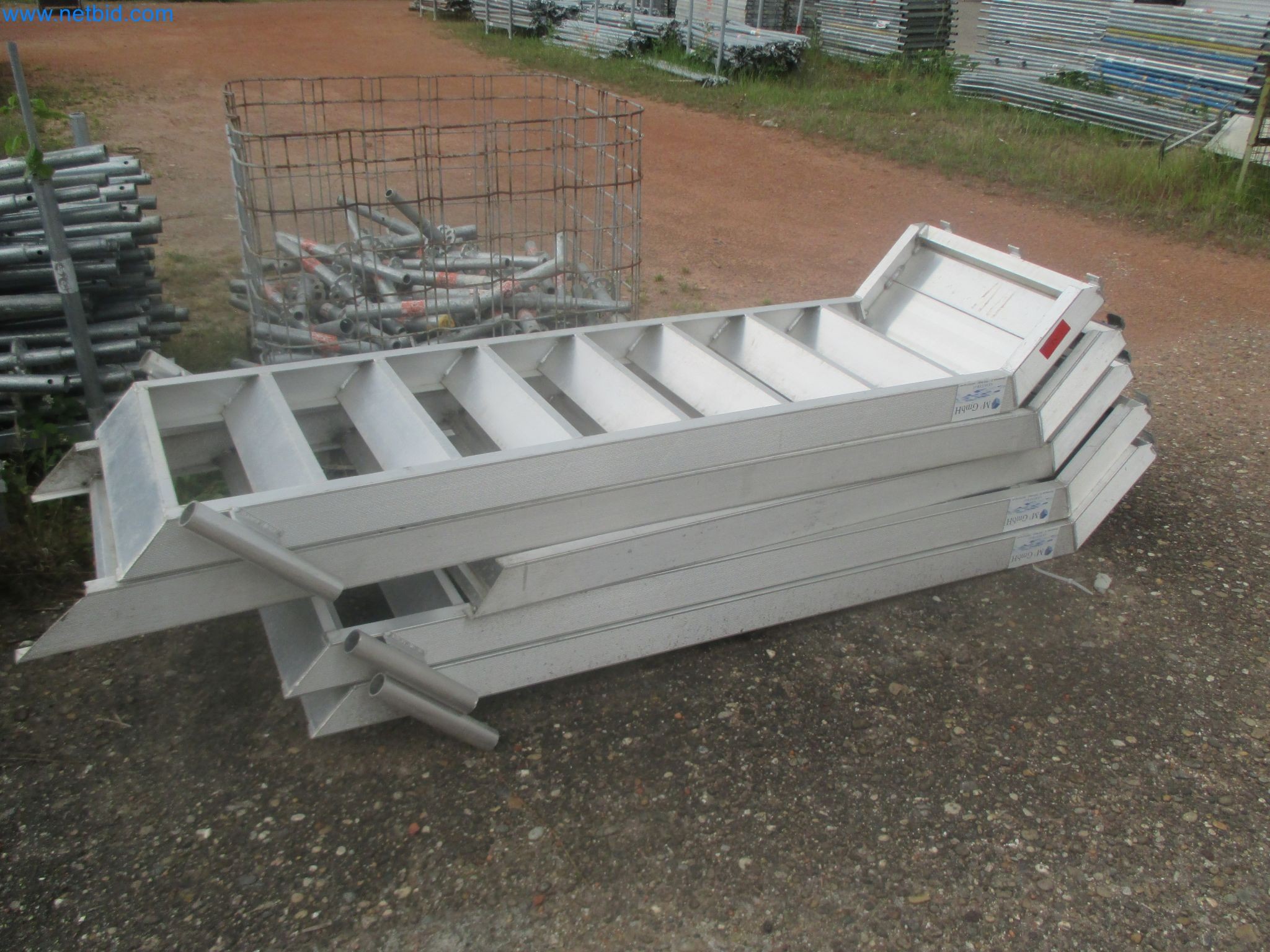 Scaffolding components (some from the construction site), machinery, and vehicles belonging to a construction company-4