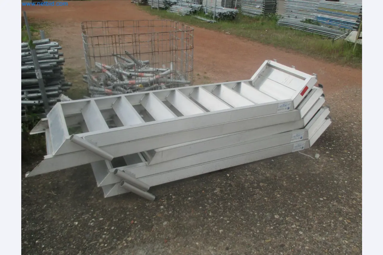 Scaffolding components (some from the construction site), machinery, and vehicles belonging to a construction company-4