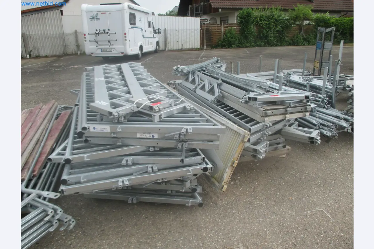 Scaffolding components (some from the construction site), machinery, and vehicles belonging to a construction company-1