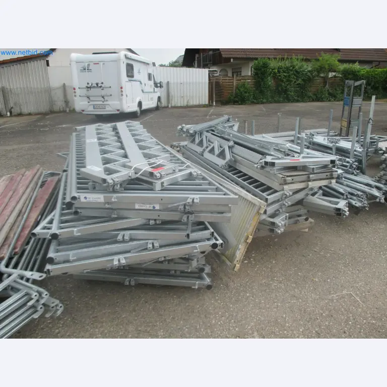 Scaffolding components (some from the construction site), machinery, and vehicles belonging to a construction company-1