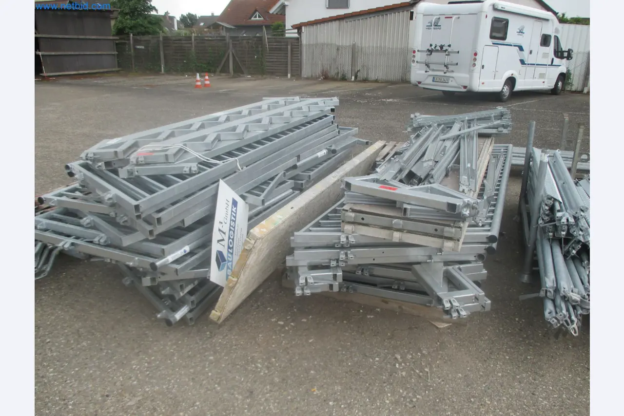Scaffolding components (some from the construction site), machinery, and vehicles belonging to a construction company-2