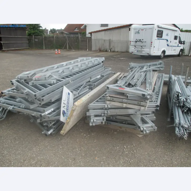 Scaffolding components (some from the construction site), machinery, and vehicles belonging to a construction company-2
