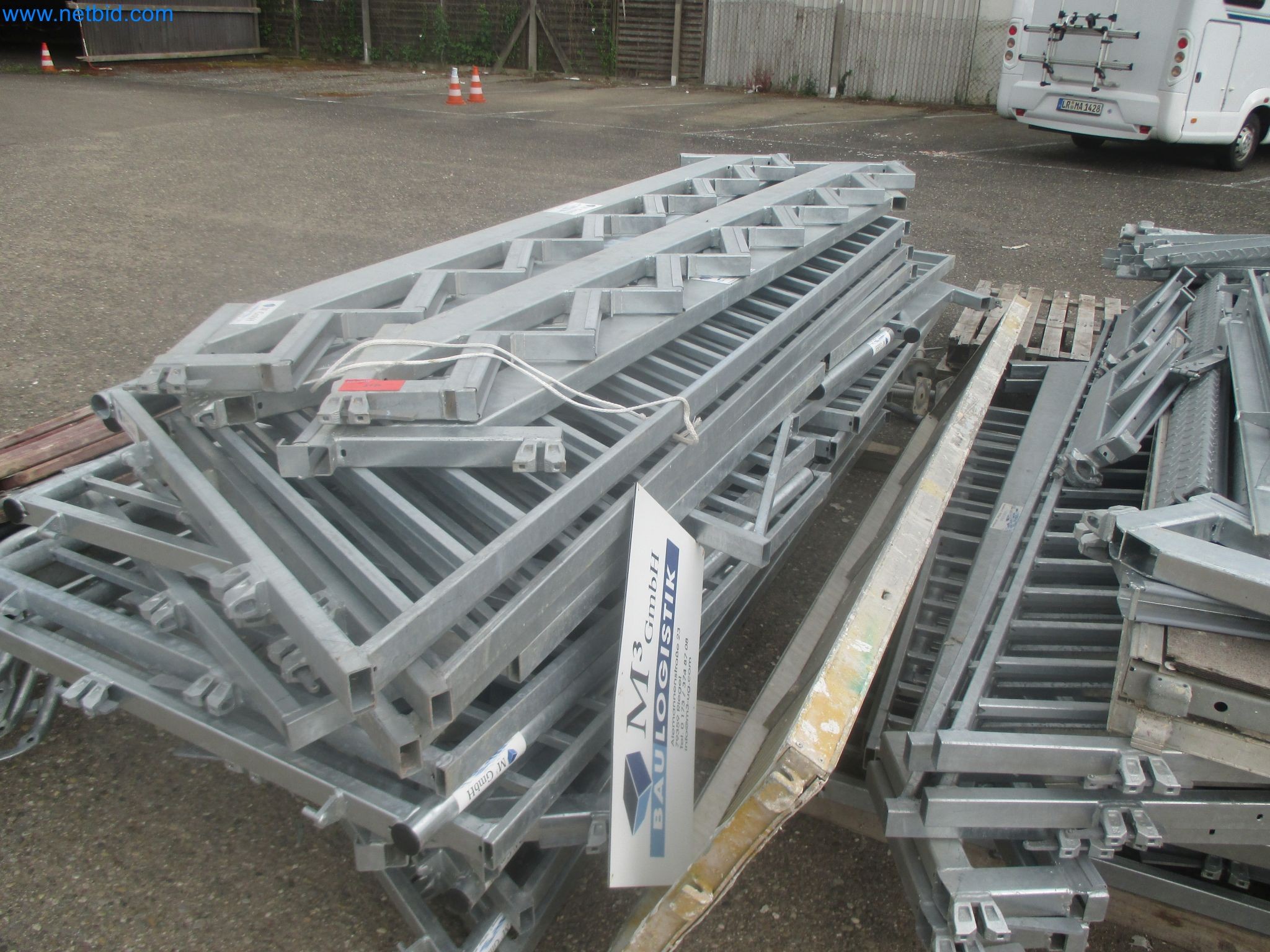 Scaffolding components (some from the construction site), machinery, and vehicles belonging to a construction company-3