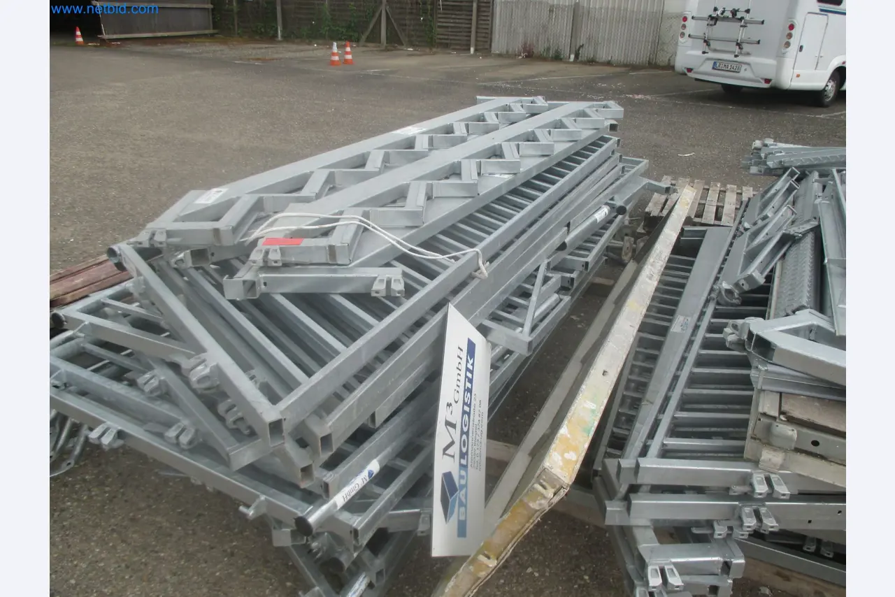 Scaffolding components (some from the construction site), machinery, and vehicles belonging to a construction company-3