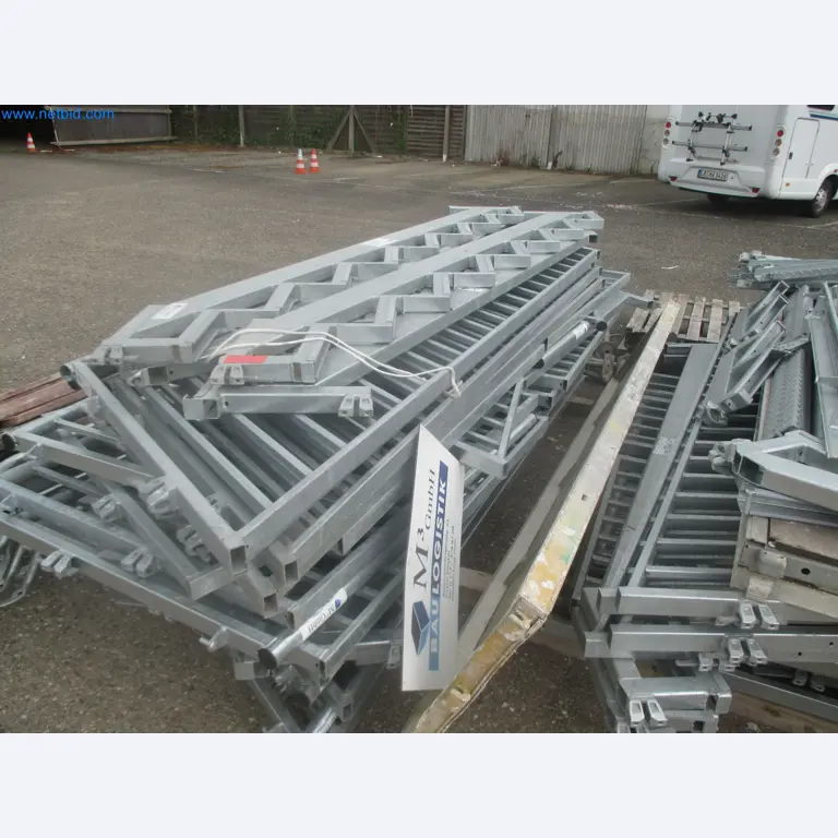Scaffolding components (some from the construction site), machinery, and vehicles belonging to a construction company-3