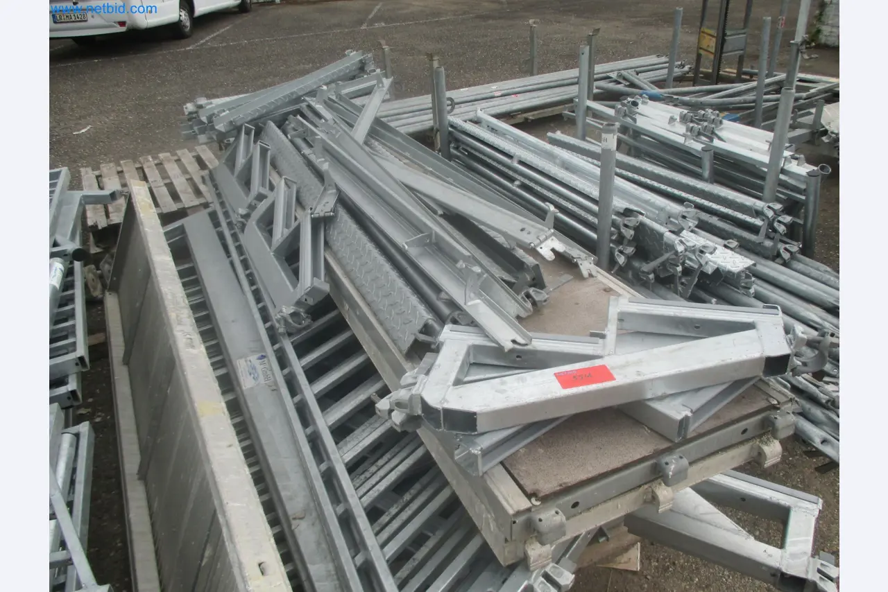 Scaffolding components (some from the construction site), machinery, and vehicles belonging to a construction company-4