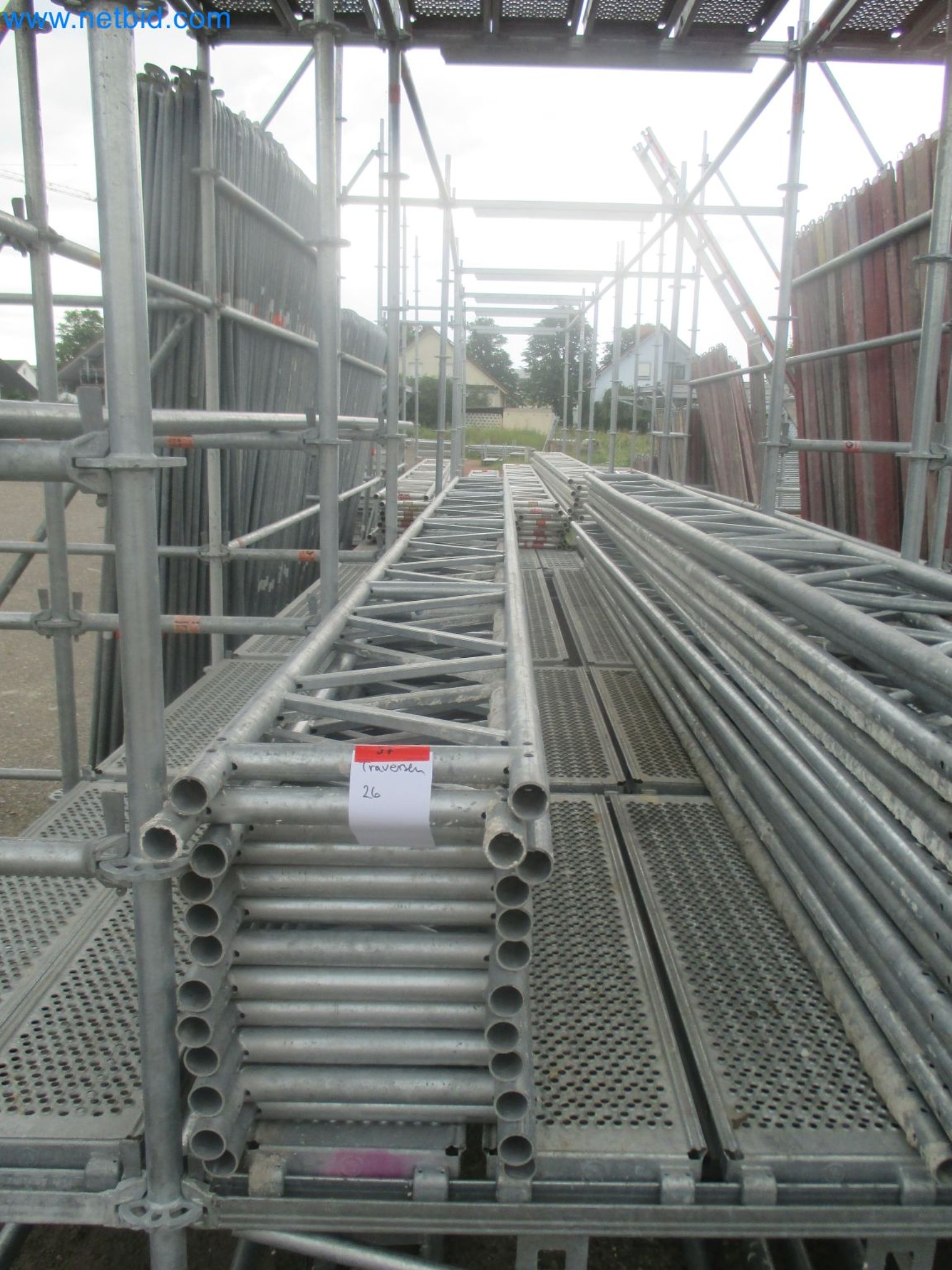 Scaffolding components (some from the construction site), machinery, and vehicles belonging to a construction company-1