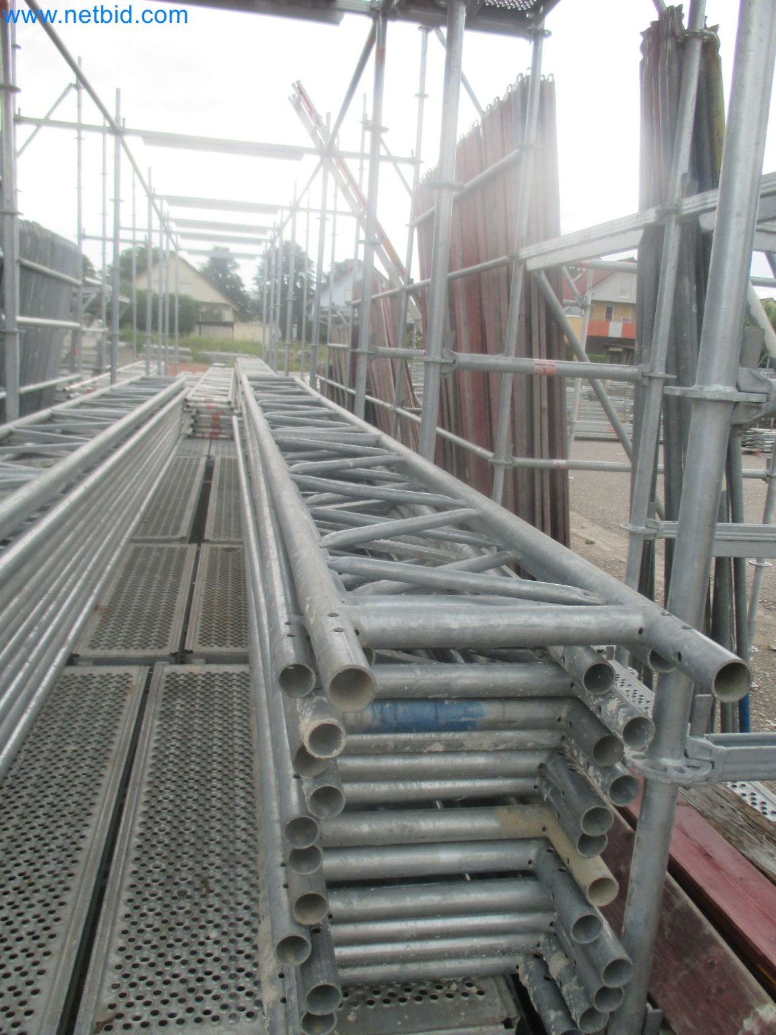Scaffolding components (some from the construction site), machinery, and vehicles belonging to a construction company-2
