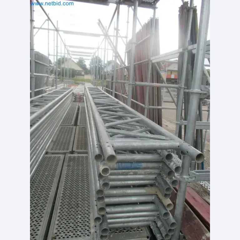Scaffolding components (some from the construction site), machinery, and vehicles belonging to a construction company-2