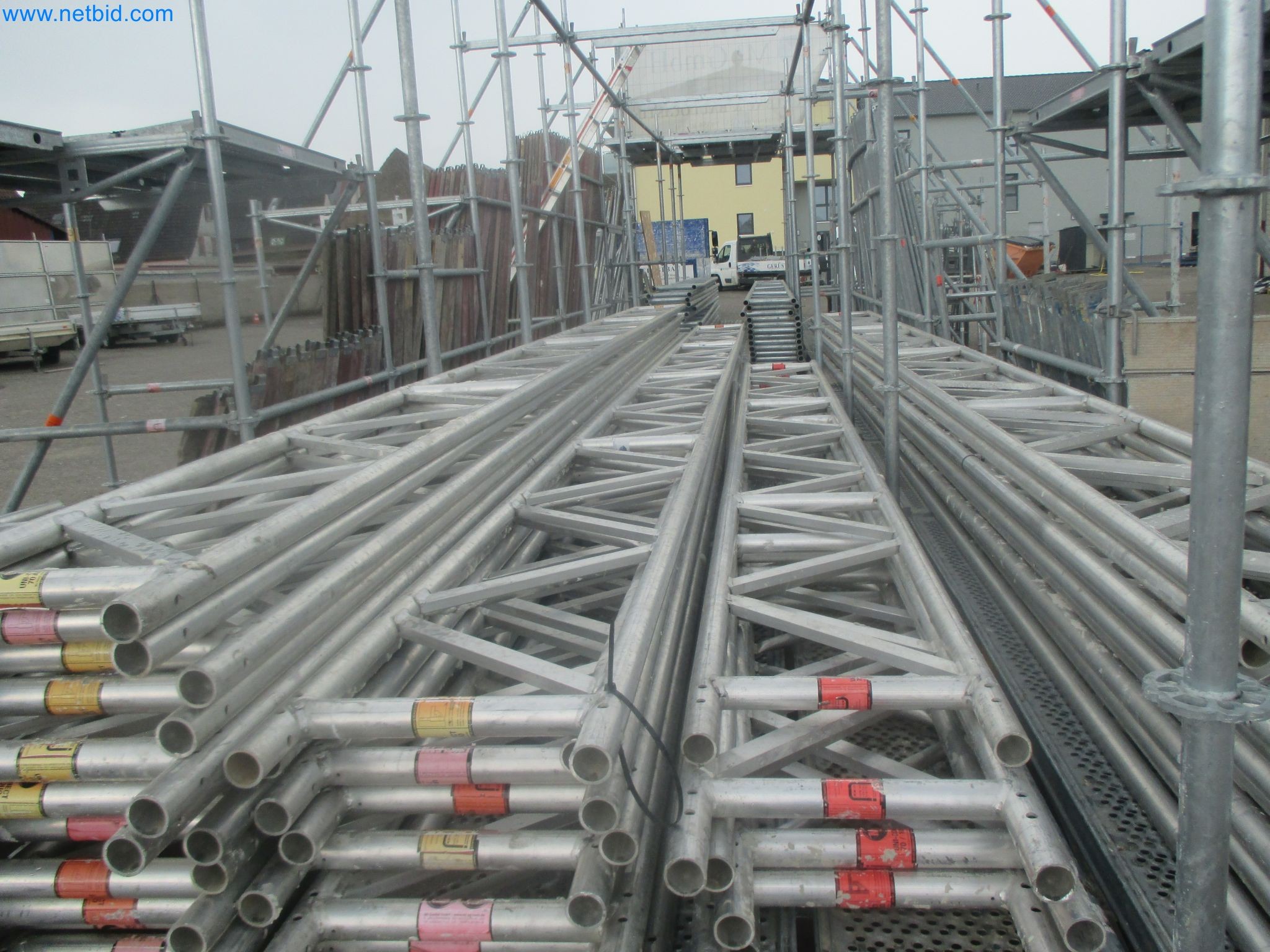 Scaffolding components (some from the construction site), machinery, and vehicles belonging to a construction company-4