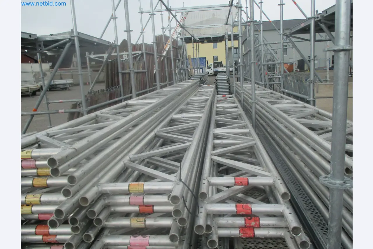 Scaffolding components (some from the construction site), machinery, and vehicles belonging to a construction company-4