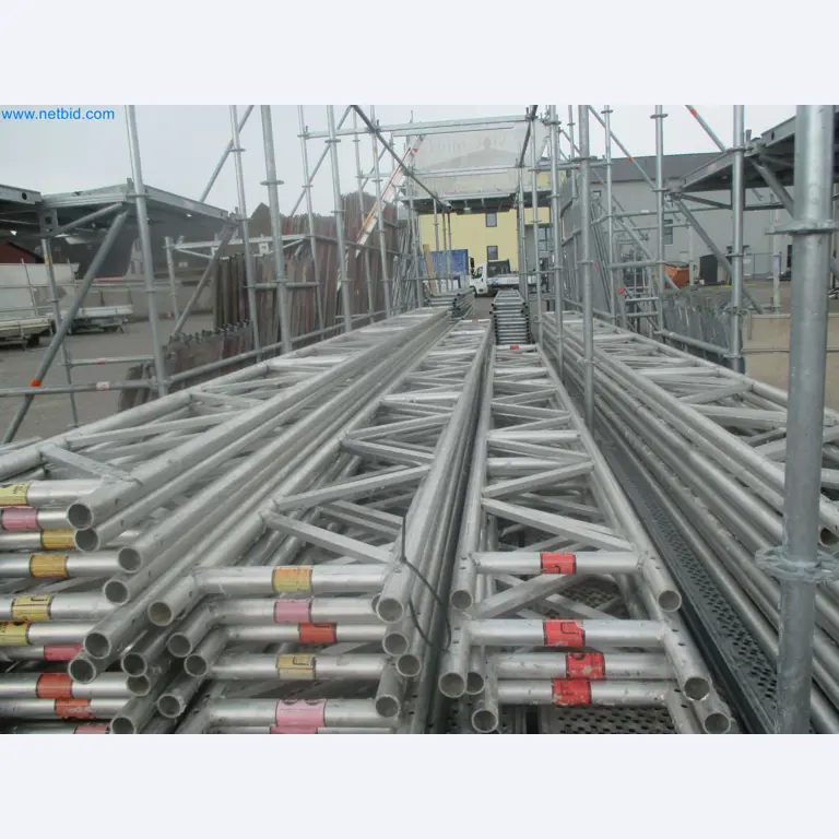 Scaffolding components (some from the construction site), machinery, and vehicles belonging to a construction company-4