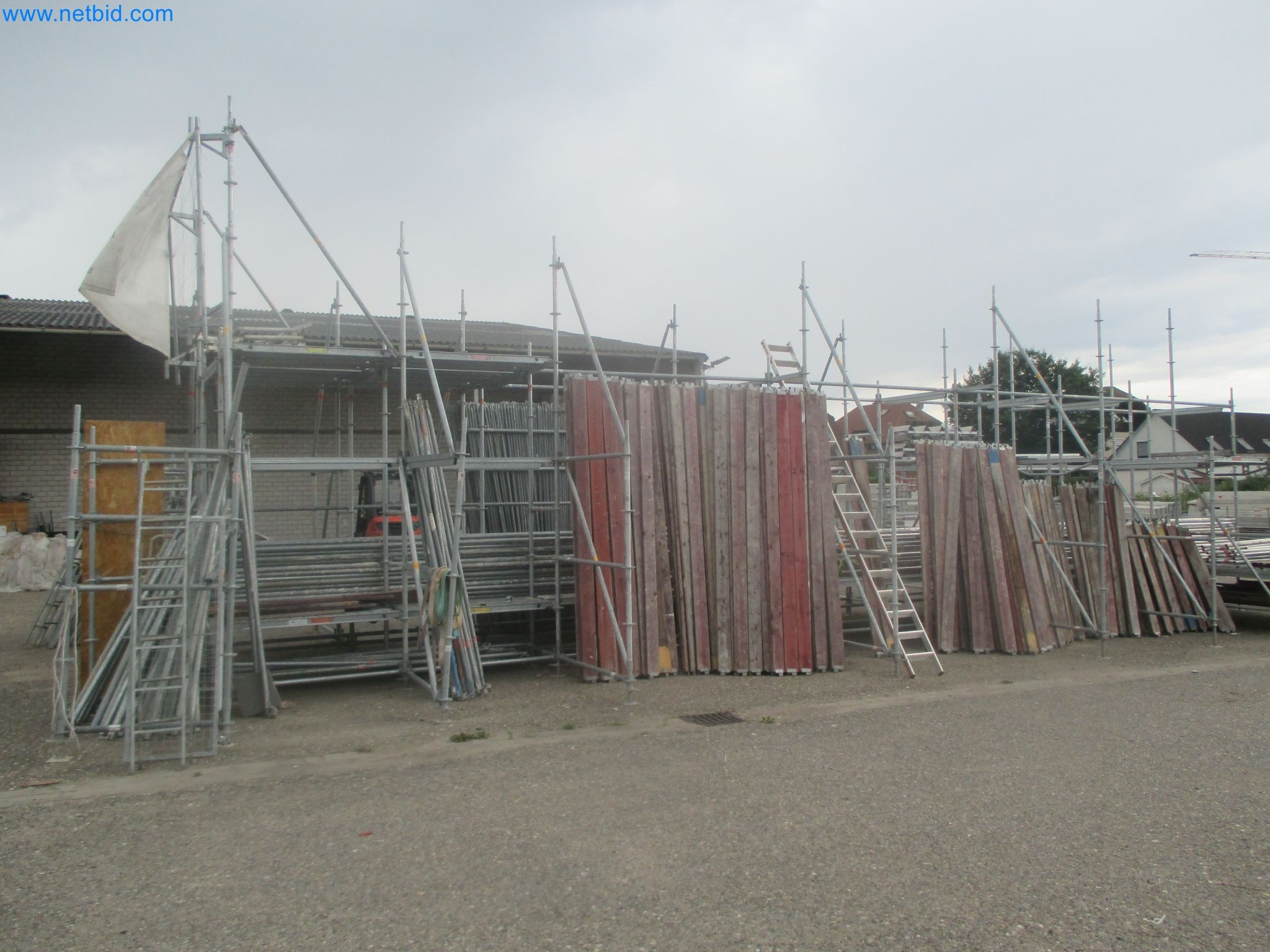 Scaffolding components (some from the construction site), machinery, and vehicles belonging to a construction company-3