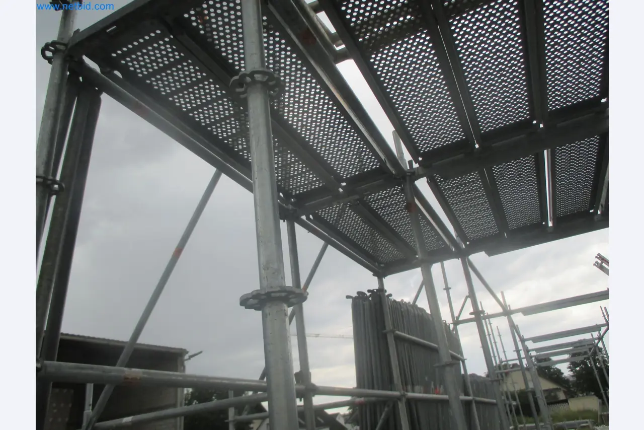 Scaffolding components (some from the construction site), machinery, and vehicles belonging to a construction company-6