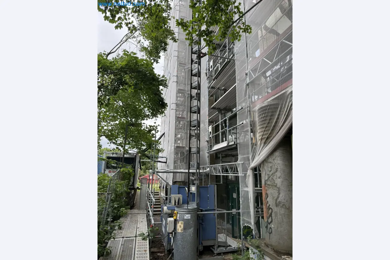Scaffolding components (some from the construction site), machinery, and vehicles belonging to a construction company-1