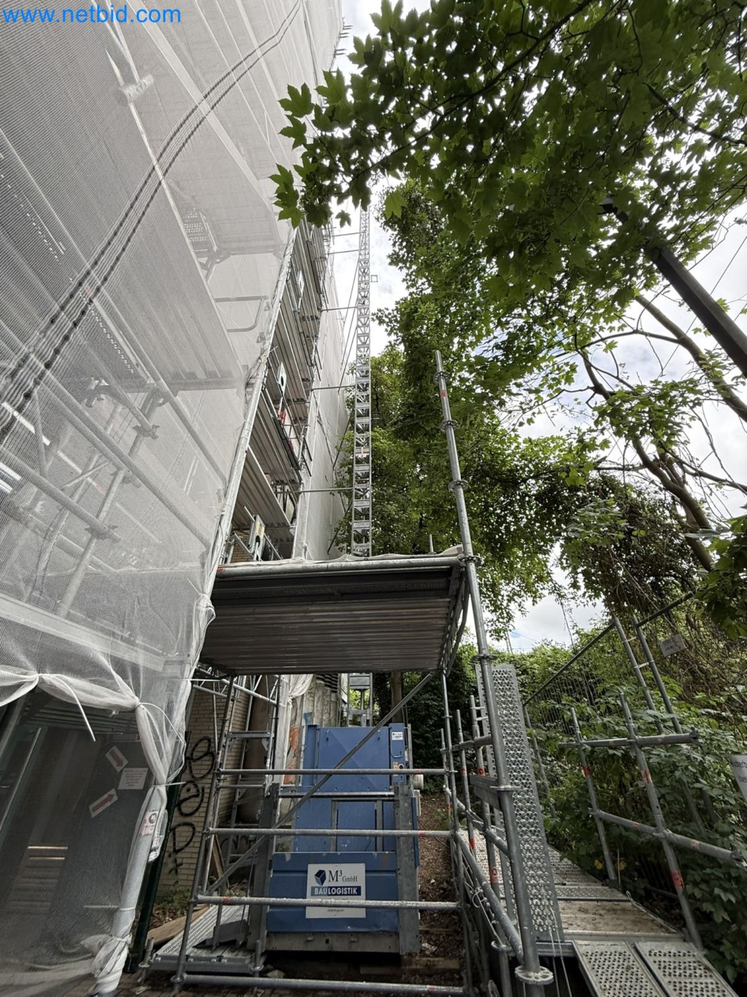 Scaffolding components (some from the construction site), machinery, and vehicles belonging to a construction company-2