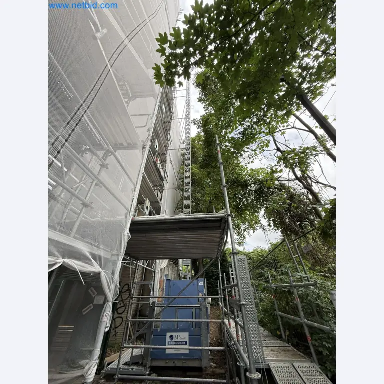 Scaffolding components (some from the construction site), machinery, and vehicles belonging to a construction company-2