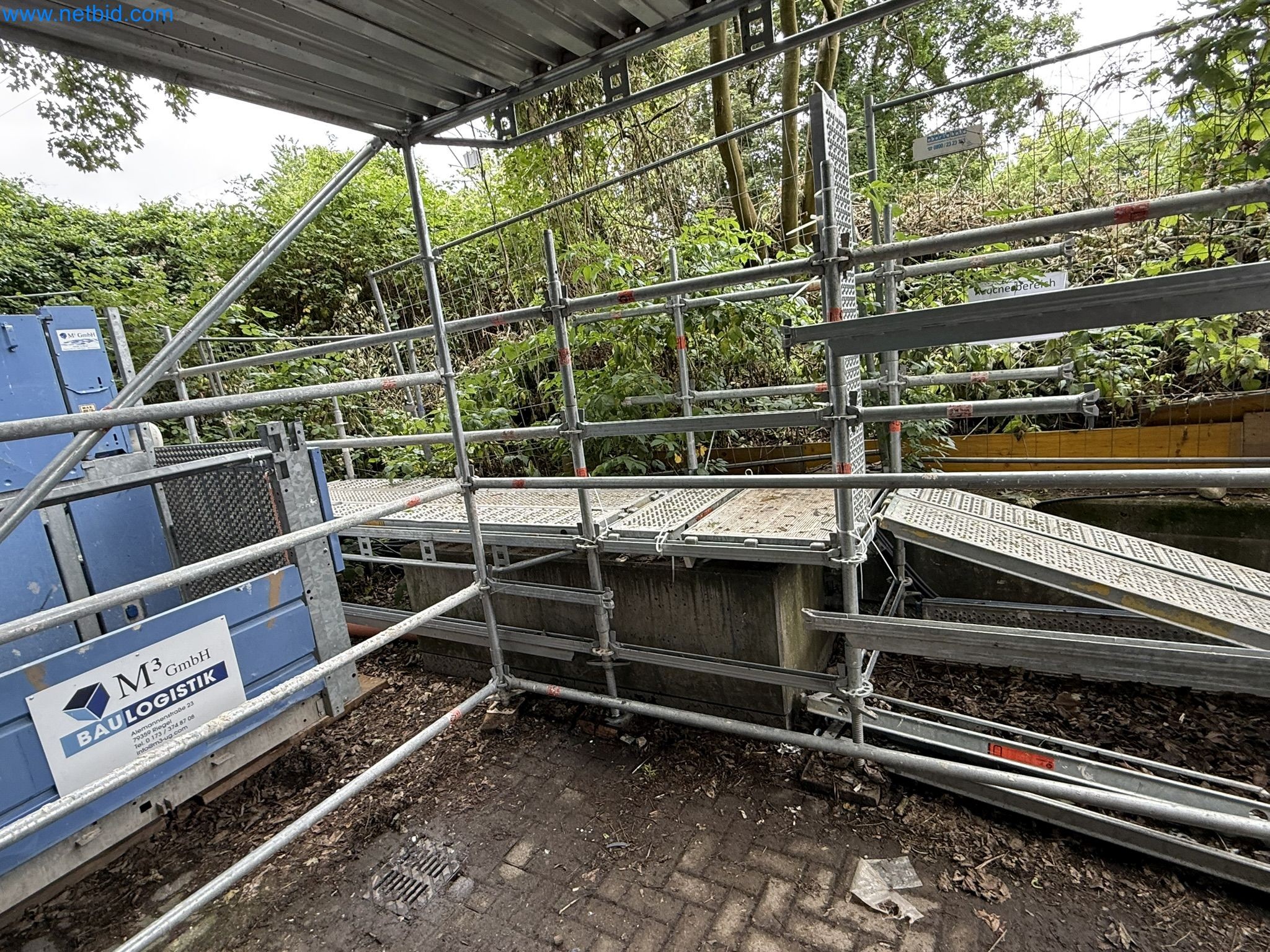 Scaffolding components (some from the construction site), machinery, and vehicles belonging to a construction company-3