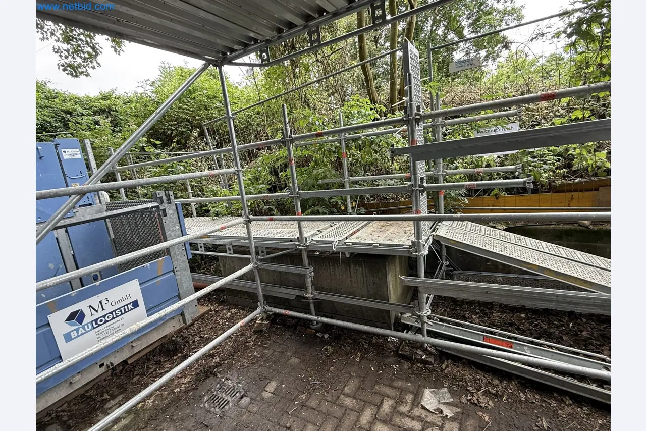 Scaffolding components (some from the construction site), machinery, and vehicles belonging to a construction company-3