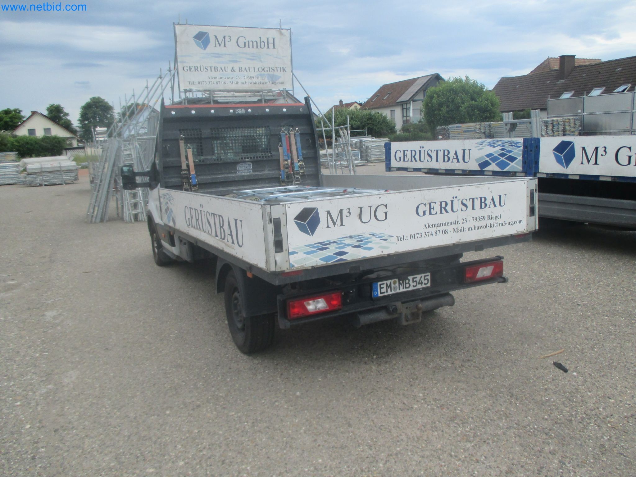 Scaffolding components (some from the construction site), machinery, and vehicles belonging to a construction company-6