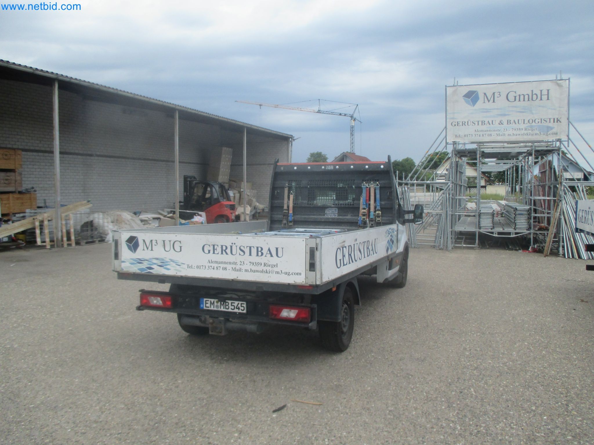 Scaffolding components (some from the construction site), machinery, and vehicles belonging to a construction company-7