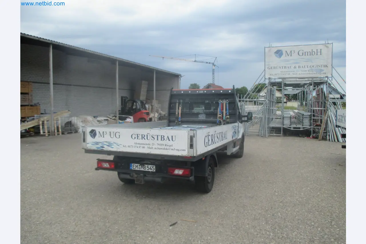 Scaffolding components (some from the construction site), machinery, and vehicles belonging to a construction company-7