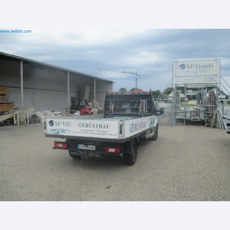 Scaffolding components (some from the construction site), machinery, and vehicles belonging to a construction company-7