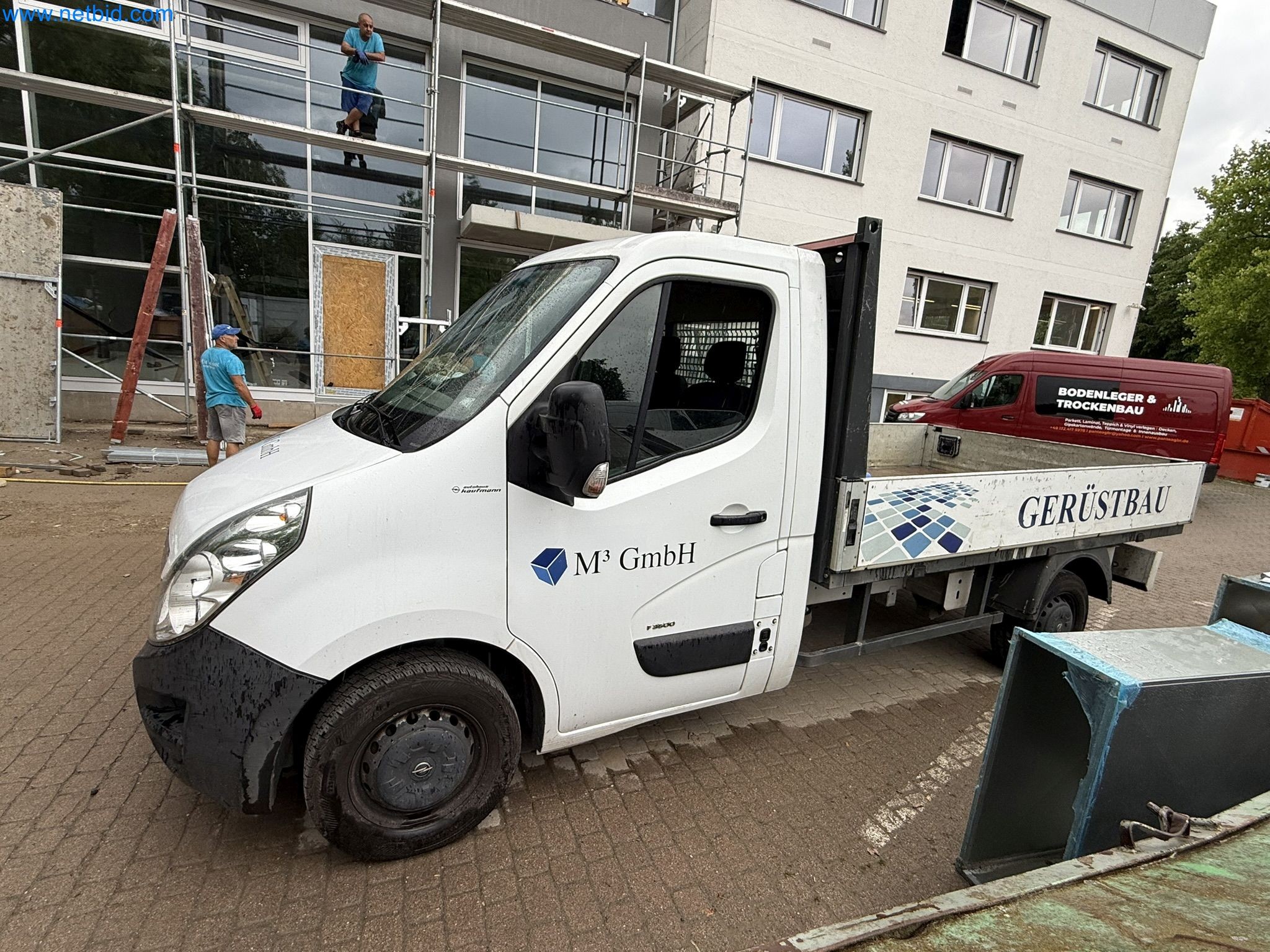 Scaffolding components (some from the construction site), machinery, and vehicles belonging to a construction company-2
