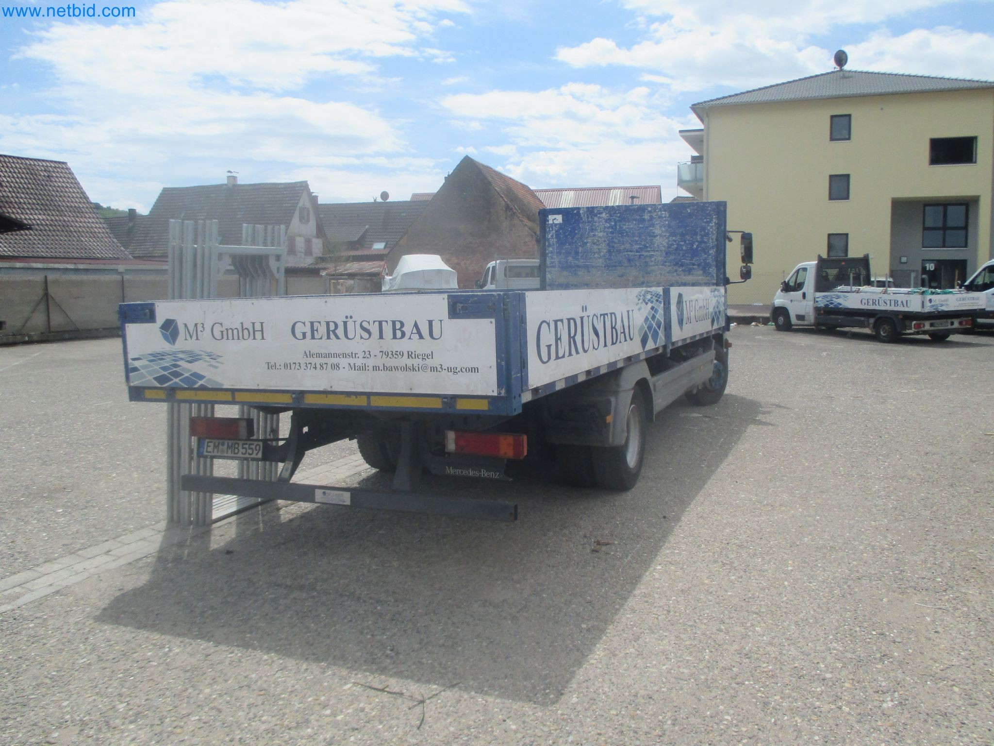 Scaffolding components (some from the construction site), machinery, and vehicles belonging to a construction company-6