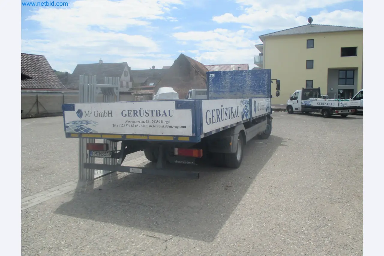 Scaffolding components (some from the construction site), machinery, and vehicles belonging to a construction company-6