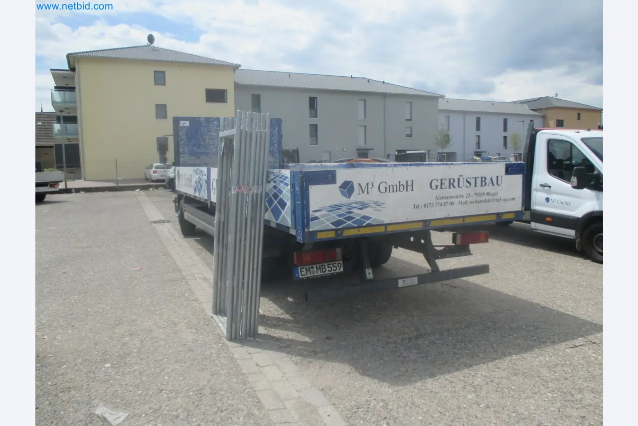 Scaffolding components (some from the construction site), machinery, and vehicles belonging to a construction company-7