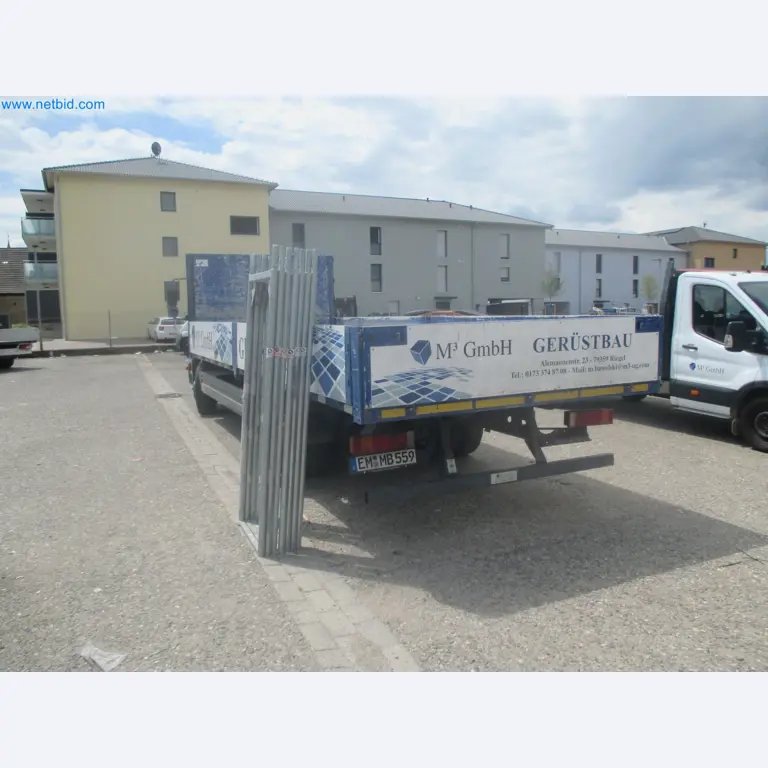 Scaffolding components (some from the construction site), machinery, and vehicles belonging to a construction company-7