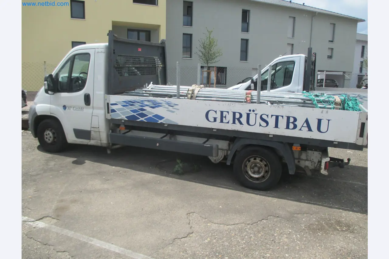 Scaffolding components (some from the construction site), machinery, and vehicles belonging to a construction company-2