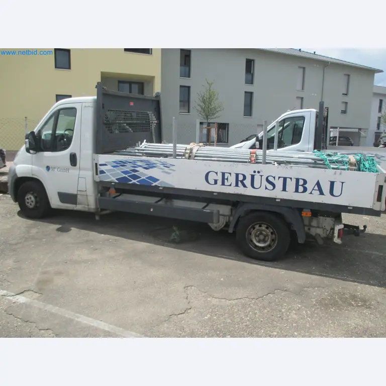 Scaffolding components (some from the construction site), machinery, and vehicles belonging to a construction company-2
