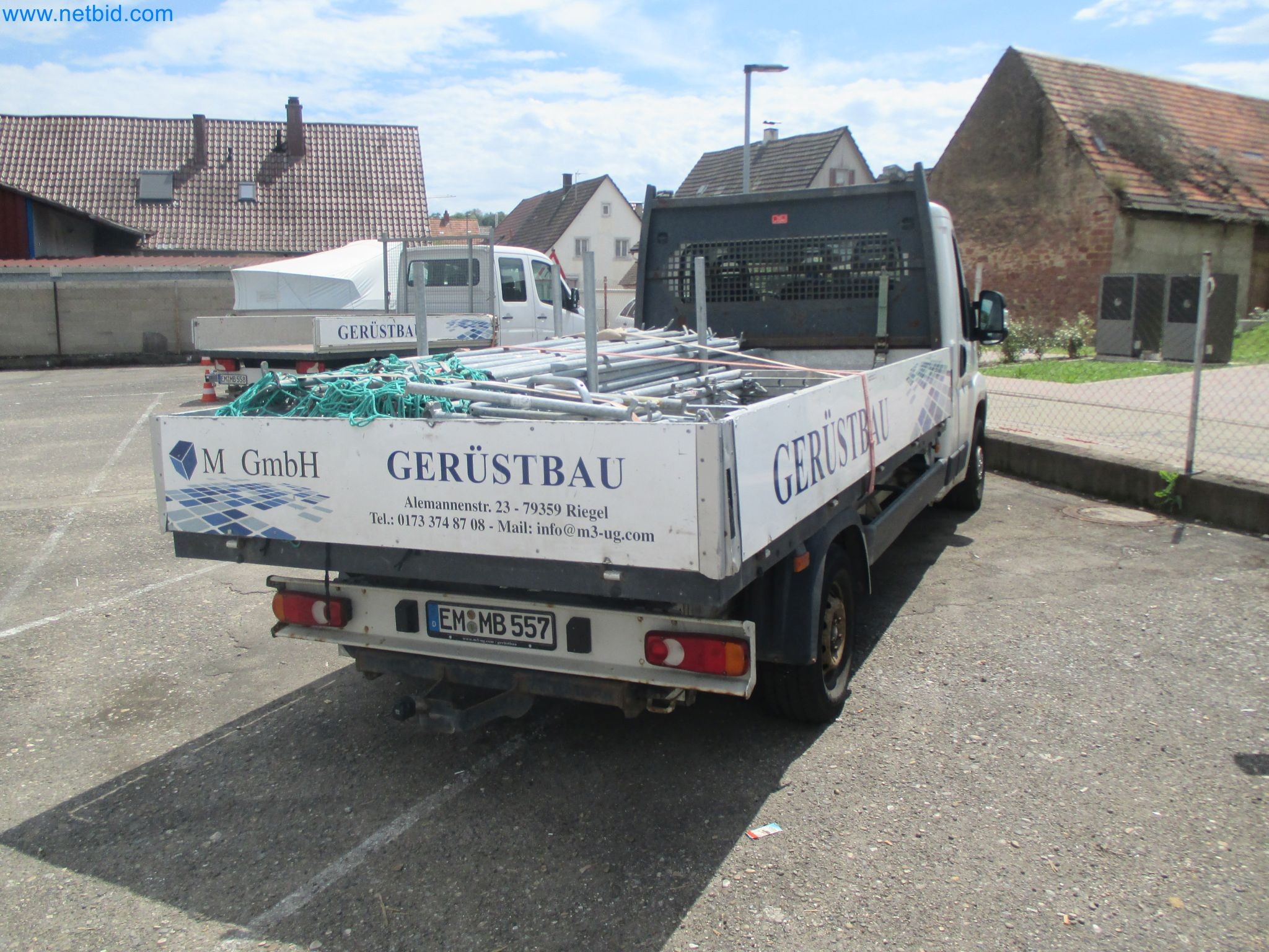 Scaffolding components (some from the construction site), machinery, and vehicles belonging to a construction company-3