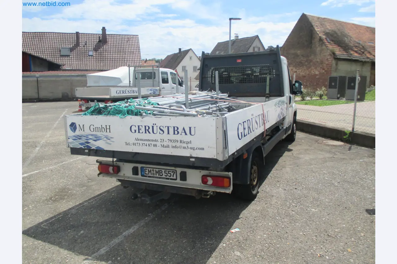 Scaffolding components (some from the construction site), machinery, and vehicles belonging to a construction company-3