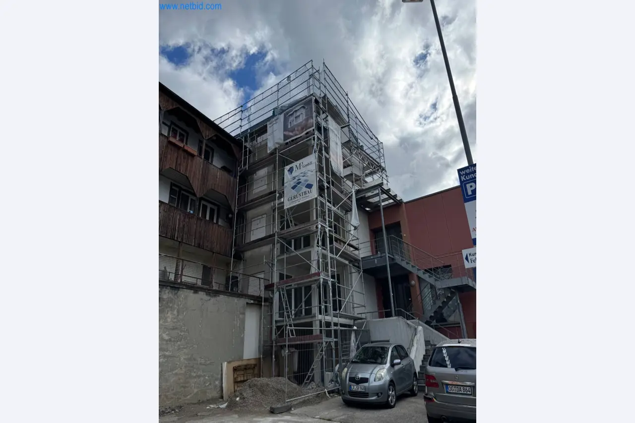 Scaffolding components (some from the construction site), machinery, and vehicles belonging to a construction company-2