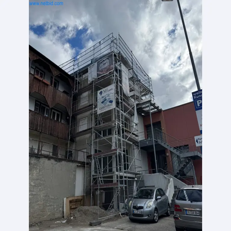 Scaffolding components (some from the construction site), machinery, and vehicles belonging to a construction company-2