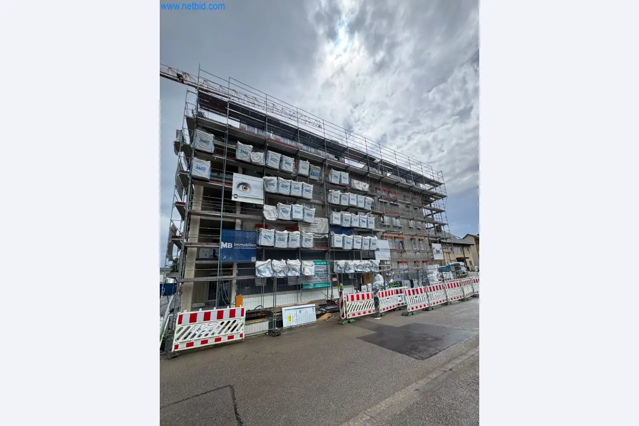 Scaffolding components (some from the construction site), machinery, and vehicles belonging to a construction company-1