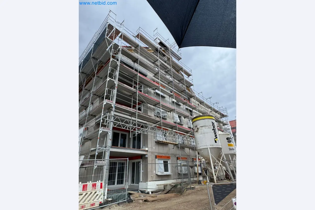 Scaffolding components (some from the construction site), machinery, and vehicles belonging to a construction company-2
