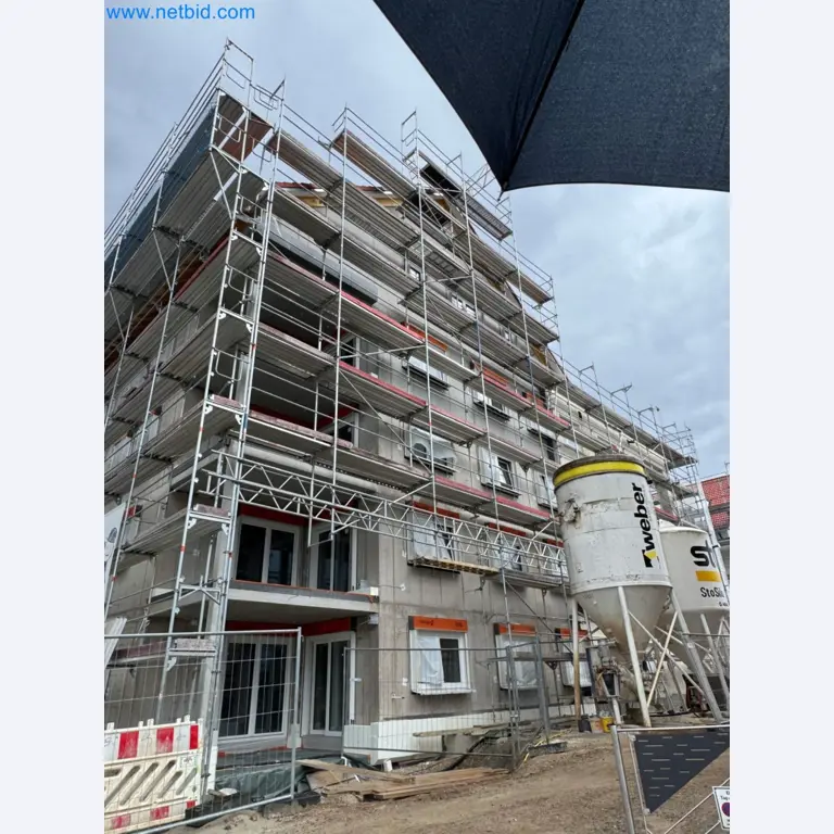Scaffolding components (some from the construction site), machinery, and vehicles belonging to a construction company-2