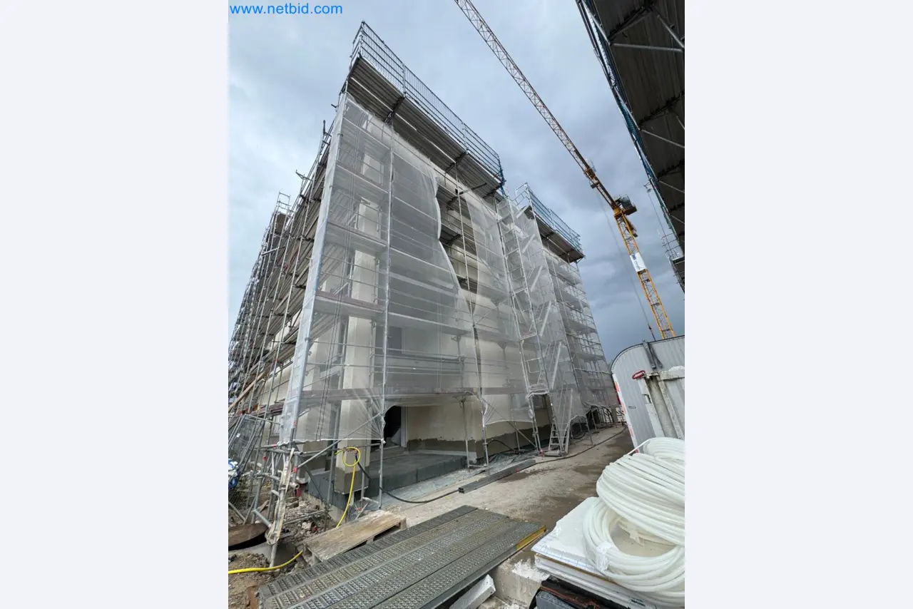 Scaffolding components (some from the construction site), machinery, and vehicles belonging to a construction company-3